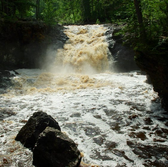 Amnicom Falls State Park is a great spot to visit. There are a series of waterfalls and rapids there, along with a covered bridge and several fun trails, places to picnic and camp. 